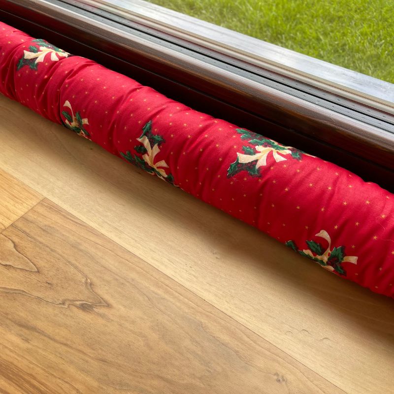 Weihnachtszugluftstopper - Glockenmuster