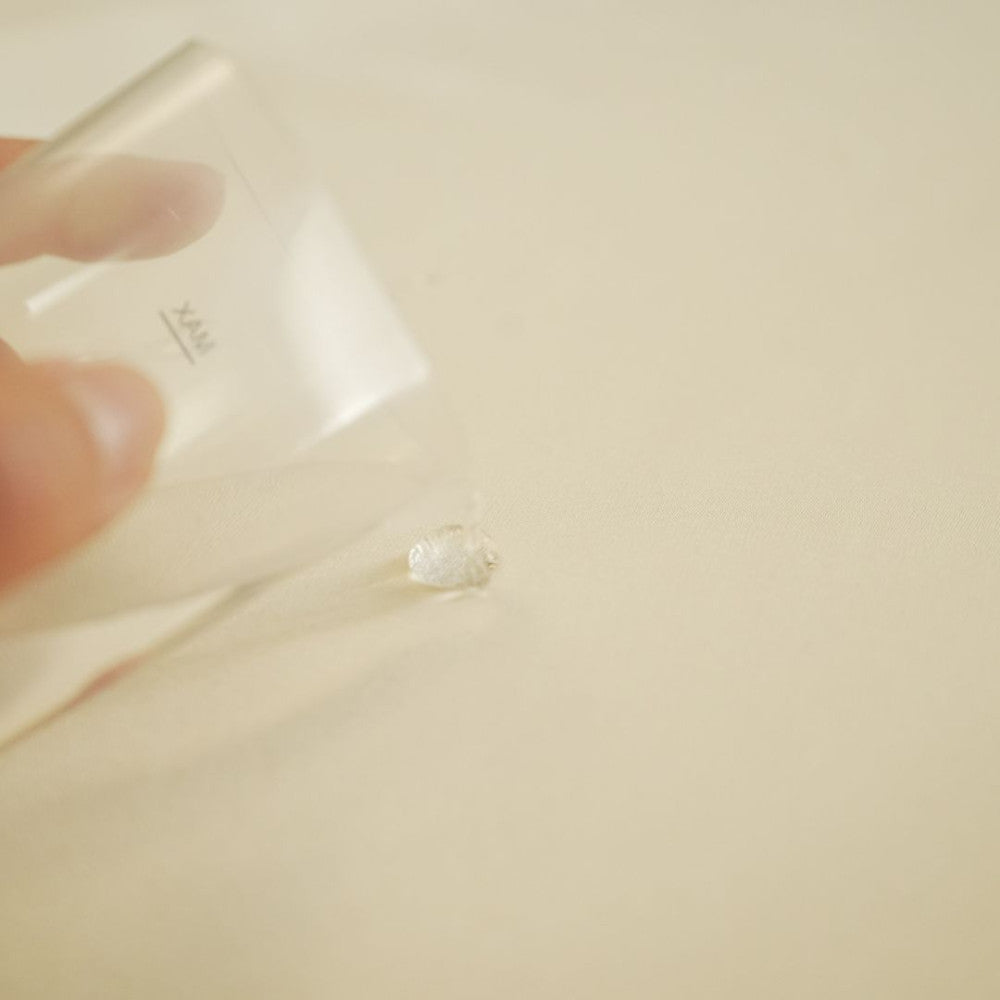 Szennytaszító asztalterítő - 50% pamut - 50% poliészter - Krém